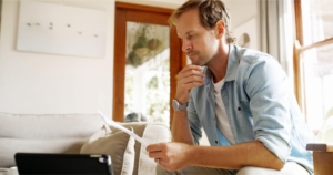 Patient reading paperwork for Cannabis telemedicine