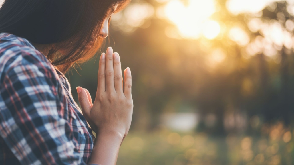 Peaceful woman outdoors, thinking about delta 8 THC